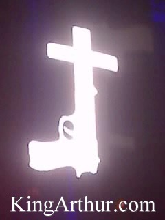 Nine Inch Nails — Gun-Cross Symbol on Stage Screen
